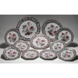 A "famille-rose" part dinner service, Qianlong, each of octagonal form, painted in the centre