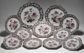 A "famille-rose" part dinner service, Qianlong, each of octagonal form, painted in the centre