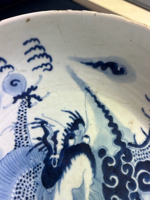 A Japanese blue and white bowl, freely painted with a dragon amongst flames and clouds, together - Image 23 of 30