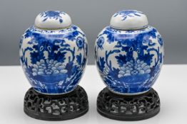 A pair of blue and white Kangxi style ginger jars and covers, 19th century, each of ovoid form and