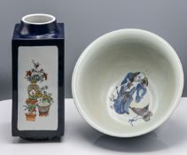 A blue ground 'famille-rose' Japanese vase in the form of a 'Cong', finely decorated on each side