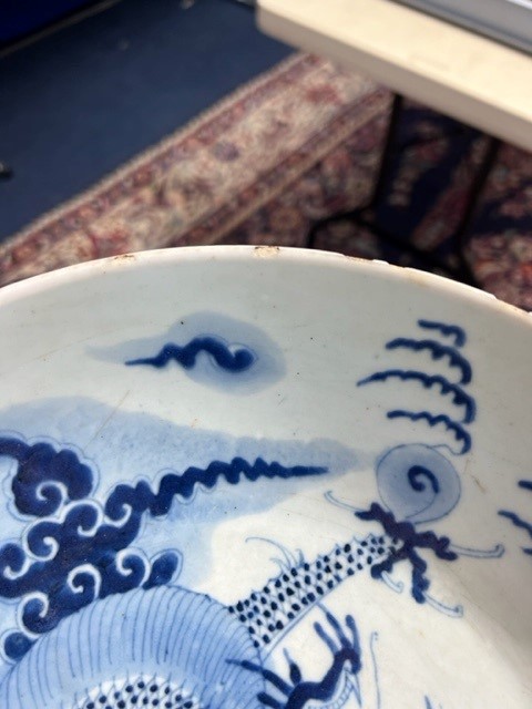 A Japanese blue and white bowl, freely painted with a dragon amongst flames and clouds, together - Image 21 of 30