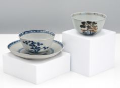 A Nanking Cargo blue and white tea bowl and saucer, 18th century. Each decorated with a pine tree