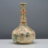 A satsuma earthenware bottle vase, Meiji period (1868-1912), signed Kinkozan. The lobed globular
