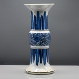A blue and white beaker vase, 19th century, heavily potted with the central knop decorated with