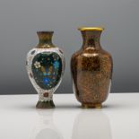 A small Chinese cloisonné enamel vase, early 20th century. Of baluster form, decorated with two