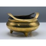 A bronze tripod censer, Qing dynasty (1644-1912) or later, The compressed globular body