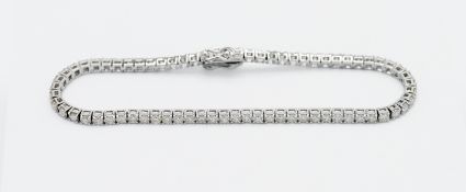 An 18ct white Tennis style gold bracelet with approx. 3ct diamonds, stud claw set, length approx.