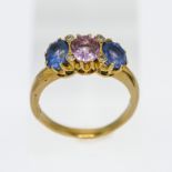 An 18ct yellow gold pink and blue sapphire ring, size T.