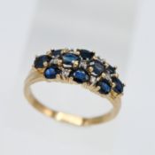 A 14ct yellow gold Pave set sapphire and diamond ring, size R