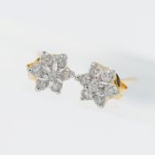 A pair of 14ct yellow gold diamond 'petal' style cluster earrings.