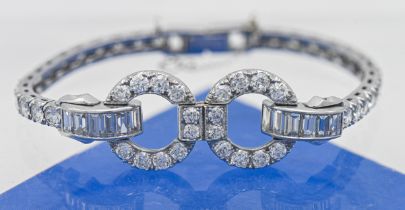 A fine art deco platinum and diamond set bracelet, length including open catch 16cm (approx. 14 cm