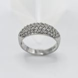 An 18ct white gold domed pave acute set diamond ring, size P, total weight approx. 4.80g.