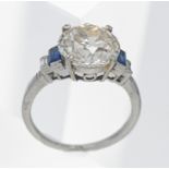 A fine large diamond single stone and platinum ring, the round cut diamond weighing approx. 4.23