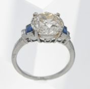 A fine large diamond single stone and platinum ring, the round cut diamond weighing approx. 4.23