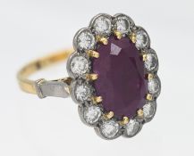 A fine 18ct ruby and diamond cluster ring, size F/G