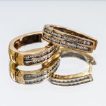 A pair 9ct yellow gold double channel set diamond hinged hoop earrings, total weight 8.90g.