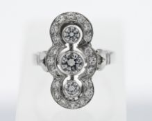 A beautiful trefoil down-fingers cluster ring, stamped 750, 18ct white gold, size M, the diamonds