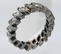A fine diamond full band eternity ring, the pear cut diamonds weighing approx. 4 carats, set in