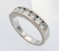 An 18ct wite gold half eternity diamond ring, size L/M.