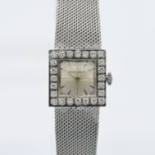 Jaeger-LeCoultre, ladies white gold cocktail watch, the square silvered dial set with a border of