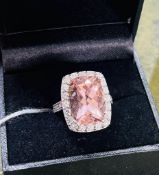 An impressive morganite and diamond cluster ring approx. 10.80ct, peach colour, clarity VS2 with GRA