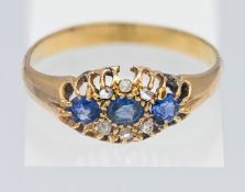 A pretty sapphire and diamond set ring, size Q.