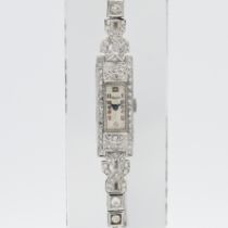 OLMA, a ladies diamond set cocktail watch (bracelet broken), rectangular case with Arabic