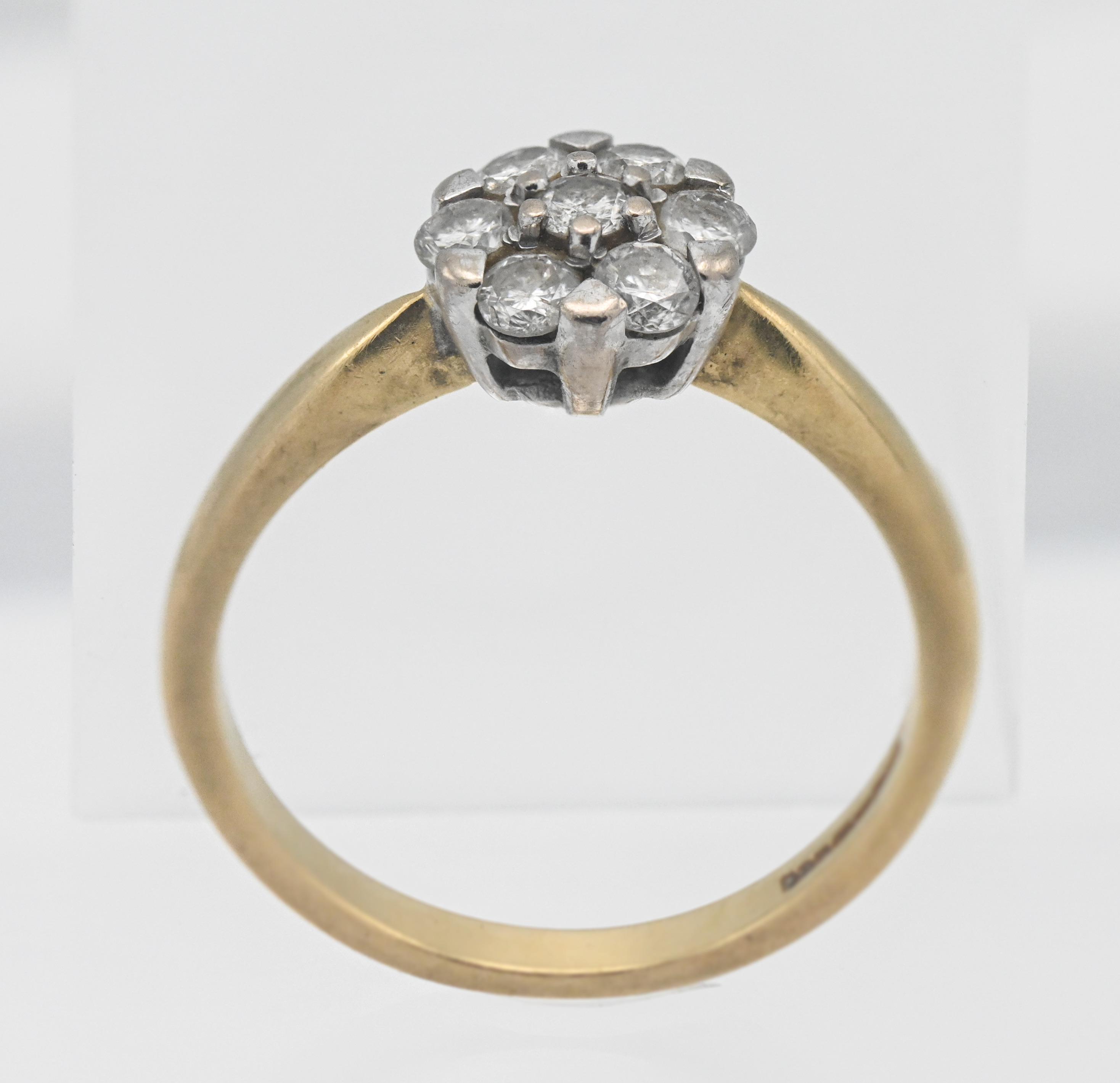 An 18ct yellow gold and diamond set cluster ring, size O.