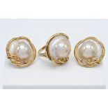 An 18ct yellow gold set of diamond blister / Mabe pearl earrings and ring set, earrings with clip