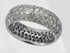 A fancy four row diamond full band eternity ring set in white, size N/O
