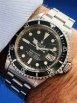 Rolex, a gents steel Oyster Perpetual date Submariner wristwatch, 660ft/200m model, Swiss-T<25 dial,