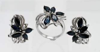 A stylish three piece sapphire and diamond ring and earring group, set in white gold