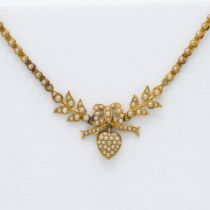 A yellow gold (probably 18ct) seed pearl lover's knot necklace, the centre knot with leaf pattern