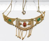 A high-carat yellow gold filigree (Indian?) gold necklet, set with emeralds and coral stones, (