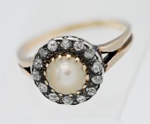 An antique pearl and diamond cluster ring, set in yellow gold, unmarked, size O.