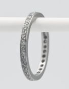 A platinum and diamond full band eternity ring, size L