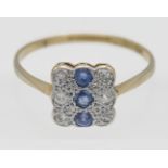 An 18ct diamond and sapphire set square shape ring, size V.