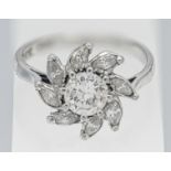 A fancy 18ct white gold and platinum diamond cluster ring, size L/M.