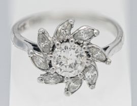 A fancy 18ct white gold and platinum diamond cluster ring, size L/M.