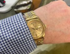 Rolex, a rare gents 18ct yellow gold Day-Date wristwatch with champagne dial, with original