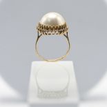 A Mabe pearl single stone ring, clawed edge settings, stamped 9ct, size N, total weight approx. 5.