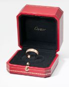 Cartier, an 18ct rose gold Bague Love ring, with original box, outer box, Cartier certificate and