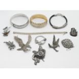 A small collection of silver jewellery to include a large silver and marcasite eagle brooch, another