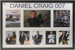 A signed Daniel Craig-007 presentation piece, with certificate of authenticity, framed, overall size