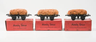 Three Hornby ‘0’ Gauge late-1930s/early wartime ‘Fibre Wagon’, black; complete with original load