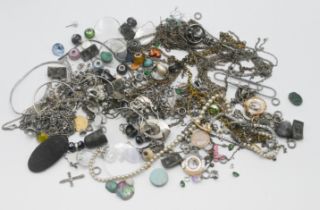 A mixed collection of costume jewellery to include necklaces, earrings etc.
