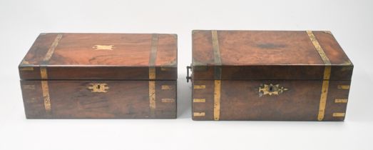Two Victorian large mahogany and brass bound writing slopes, with ink bottles.