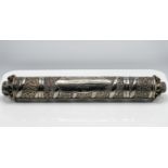 A large Indian silver ornate scroll cylindrical scroll holder, length 56cm each end decorated with