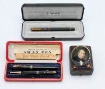 A 19th century portrait miniature, a two piece Swan fountain pen/pencil boxed set (14ct gold nib)